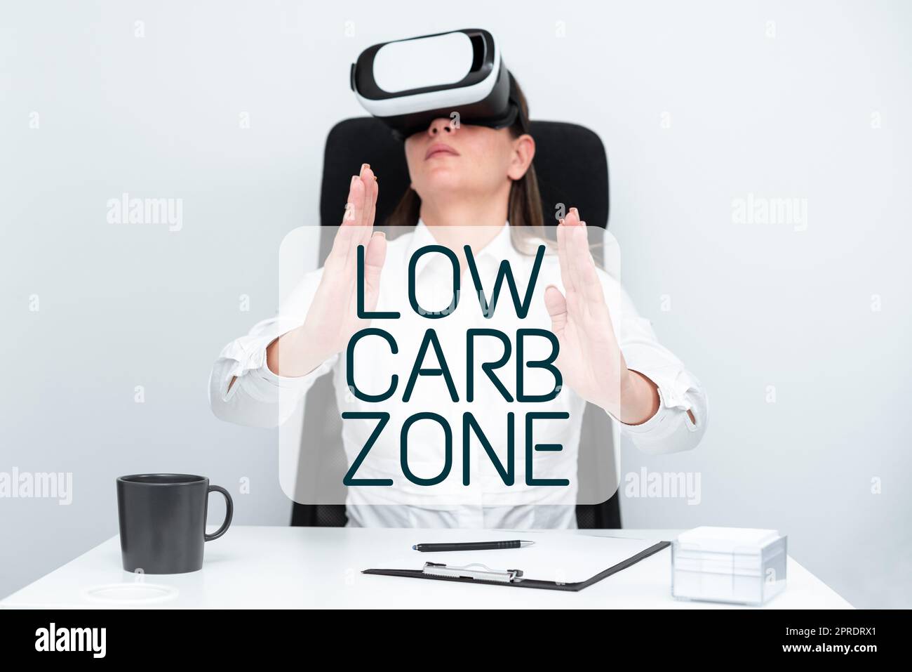 Text showing inspiration Low Carb Zone. Word Written on Healthy diet for losing weight eating more proteins sugar free Woman Wearing Headset And Learning Skill Over Virtual Reality Simulator. Stock Photo