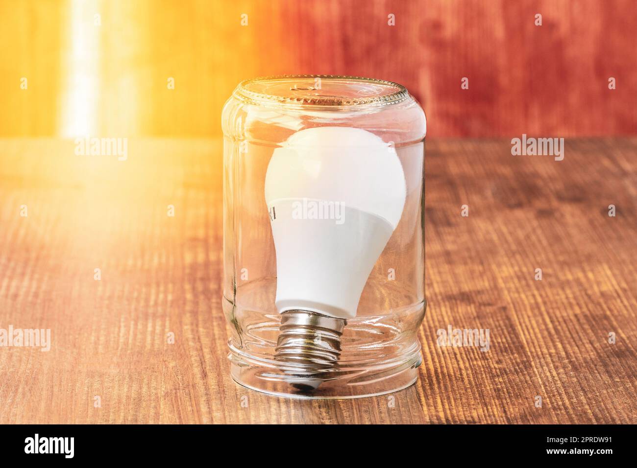 Light bulb inside glass jar Stock Photo