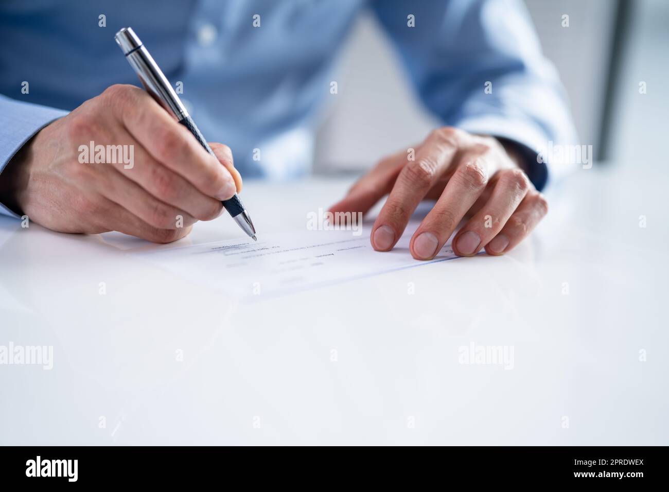 Writing Money Cheque. Sign Check Or Paycheck Stock Photo - Alamy