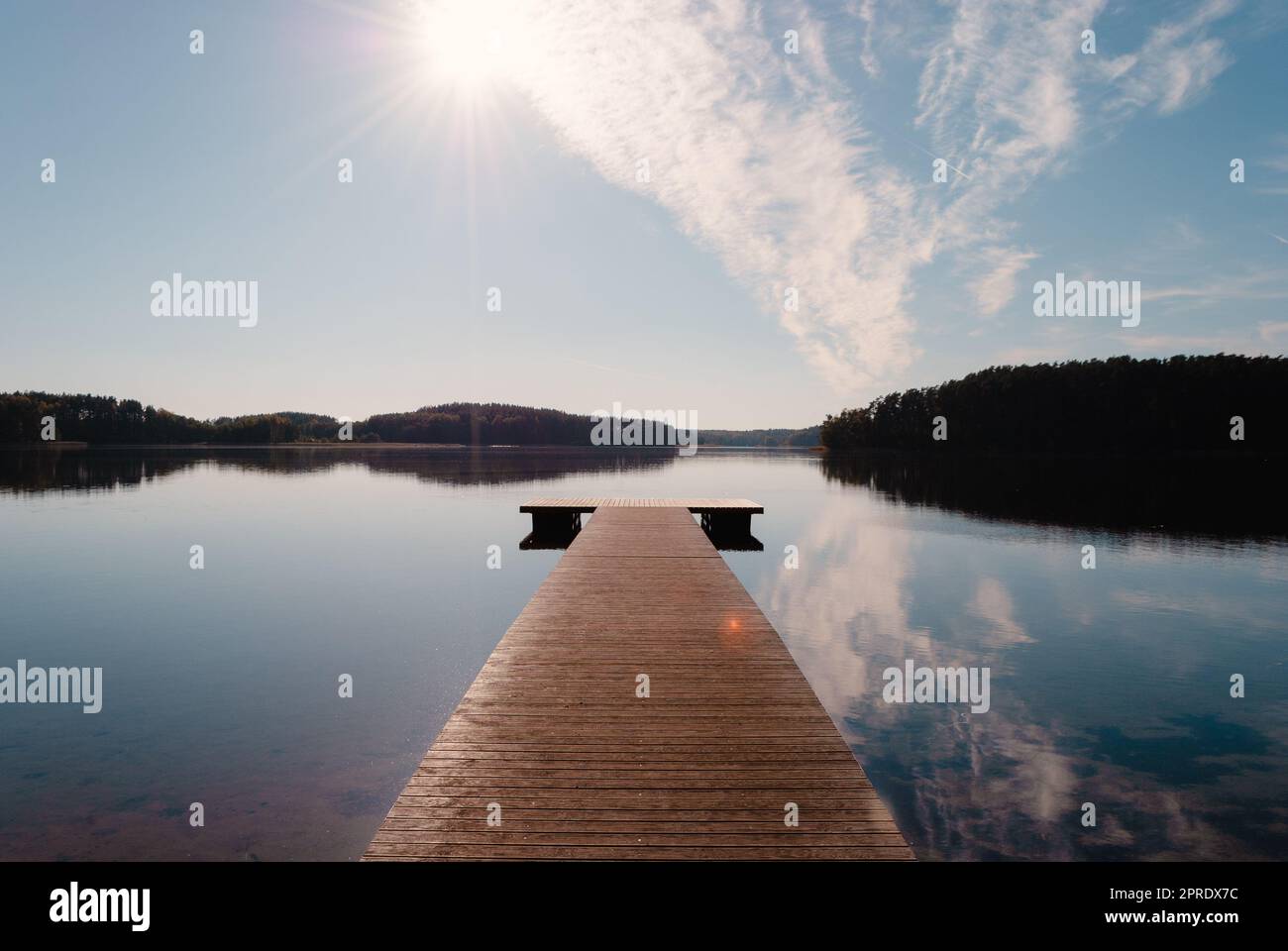 Wooden pier on Lake Baltieji Lakajai in Labanoras Regional Park, Lithuania. Stock Photo