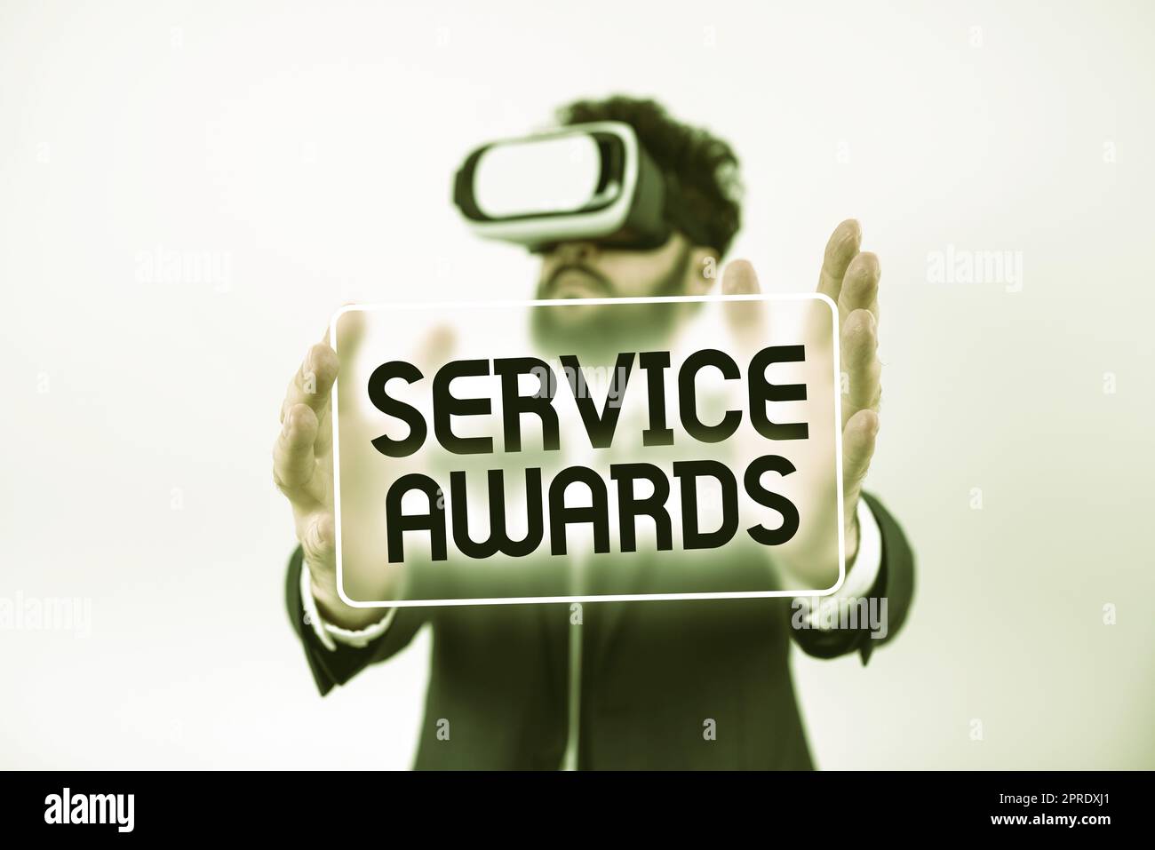 Conceptual caption Service AwardsRecognizing an employee for his or her longevity or tenure. Business overview Recognizing an employee for his or her longevity or tenure Stock Photo