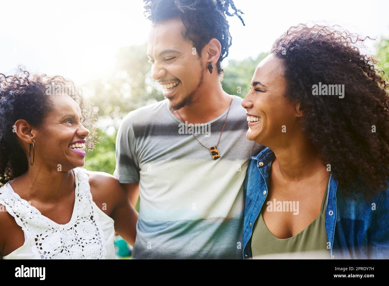 Nothing is better than being together. friends spending time together outdoors. Stock Photo