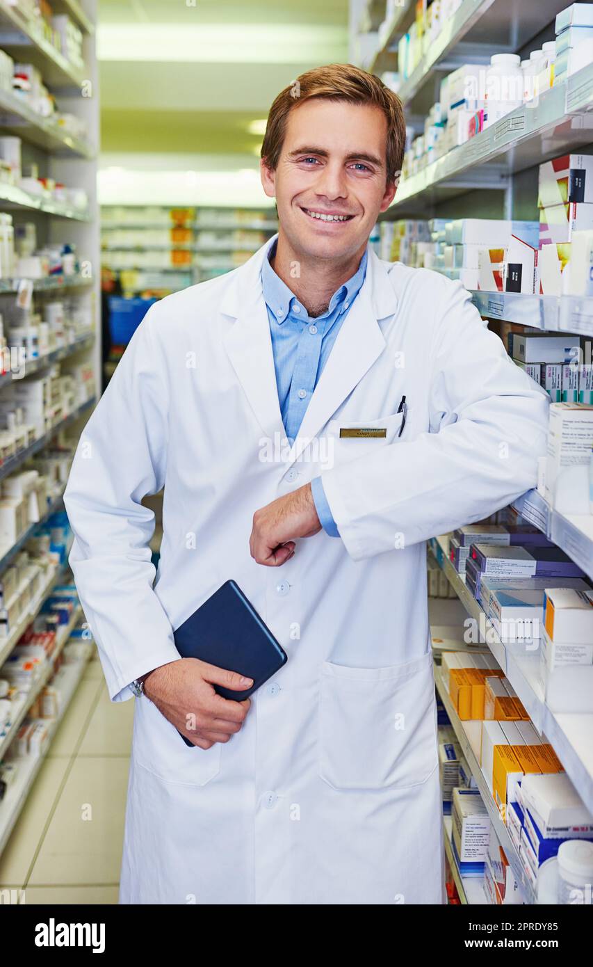You can lean on me to keep you well. Portrait of a confident young pharmacist working in a pharmacy. Stock Photo