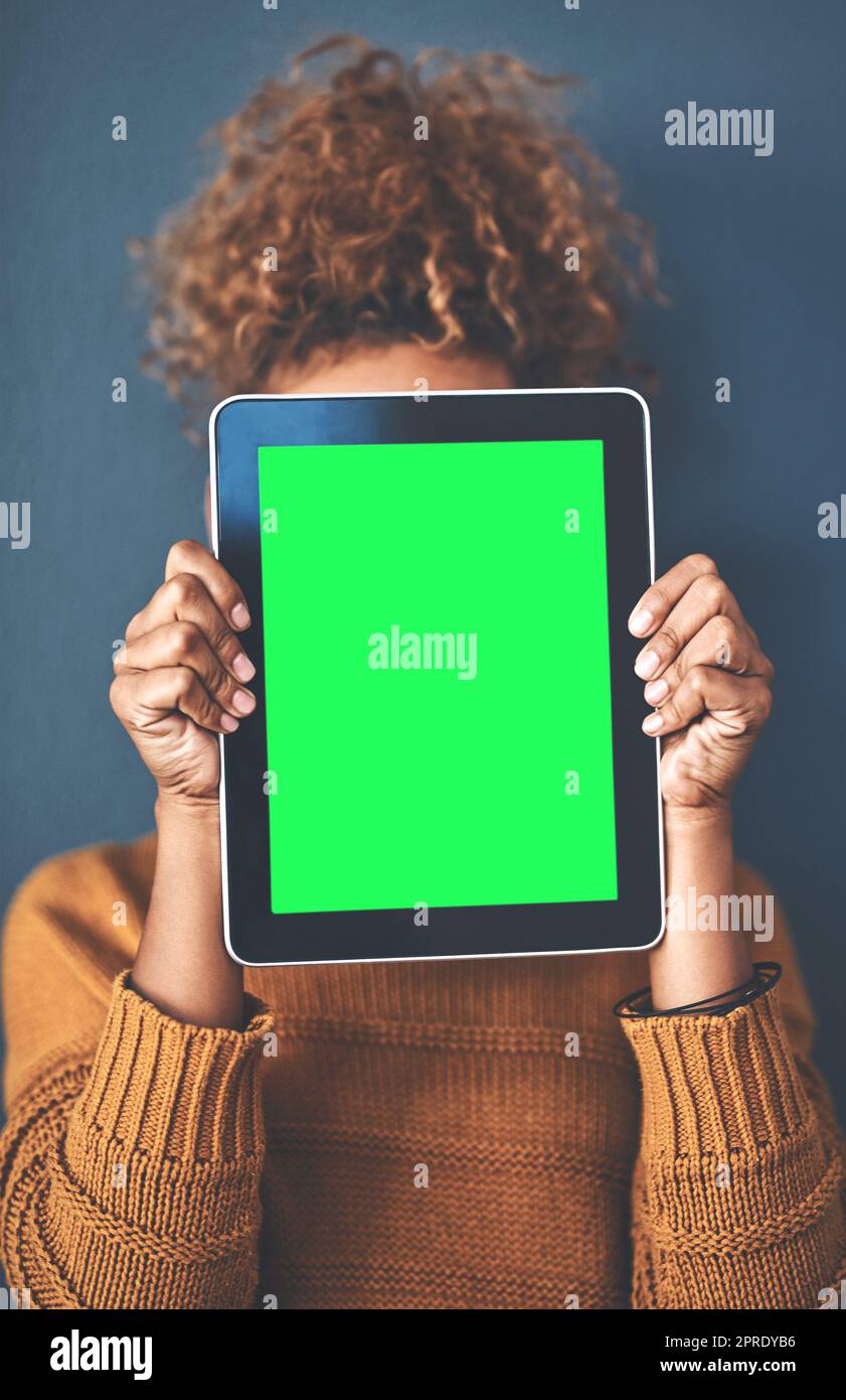 Green screen, copy space and chromakey on a tablet of a woman showing website for online advertising. Closeup of female with blank touch screen, branding for a business logo or news and marketing Stock Photo