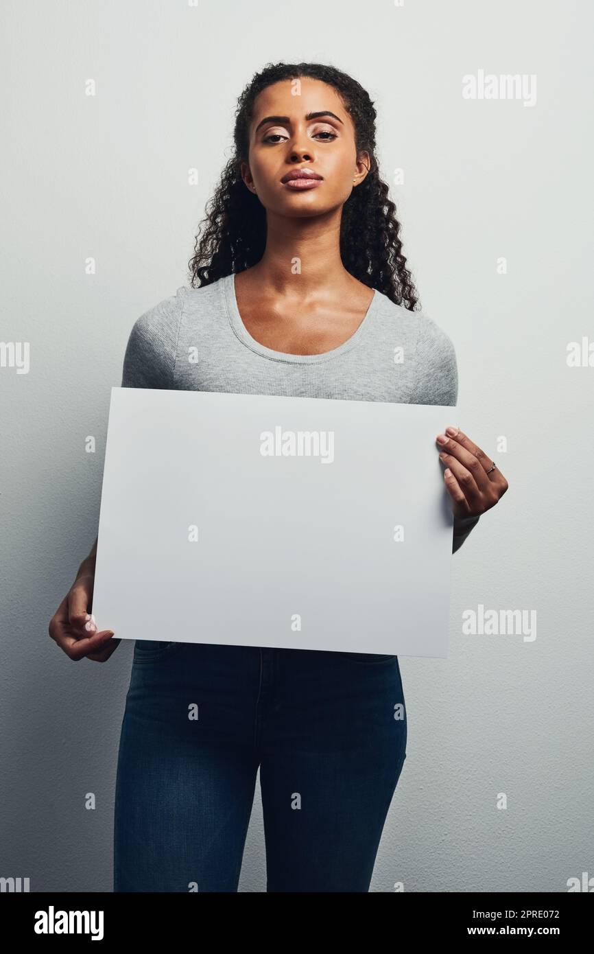 Woman holding placard hi-res stock photography and images - Alamy