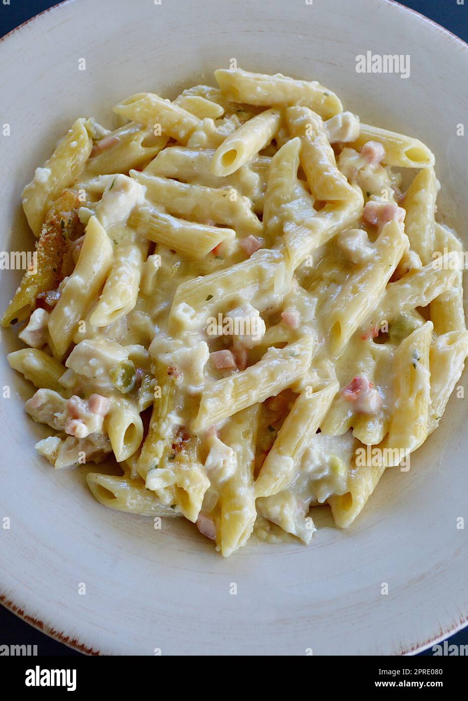 Chicken and bacon pasta bake Stock Photo - Alamy