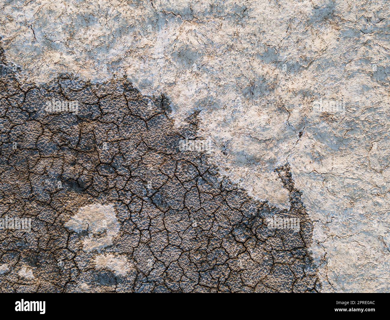 Geology.Dried-up riverbeds and lakes. Drought, global warming and climate change. Cracked dry earth and soil.Dry desert, drought season. Idea concept symbol disaster ecology in nature. Stock Photo