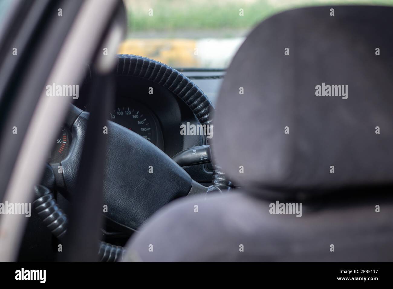 Damaged car window after an accident. Broken windshield as a result of ...