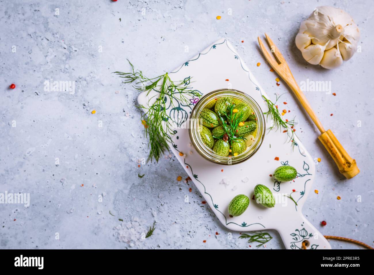 Homemade food: Pickled cucamelons (pickled cucumbers, pickled gherkins), grown in a organic kitchen Stock Photo
