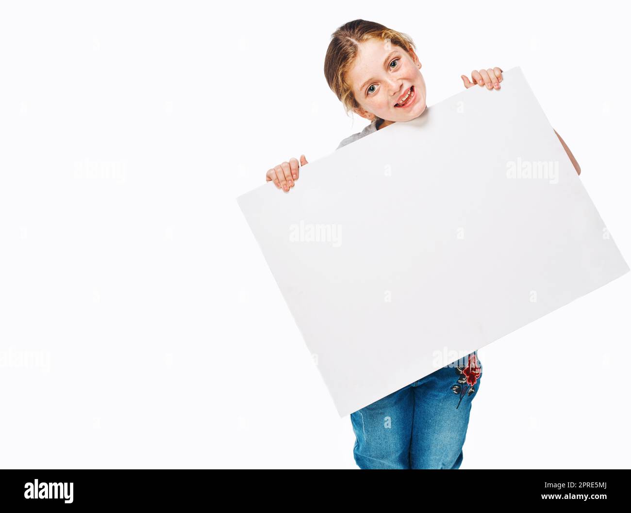 Girl holding placard hi-res stock photography and images - Alamy