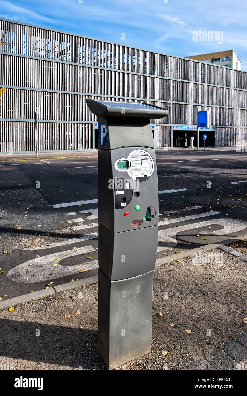 Parking ticket machine at a paid parking lot, still life and closeup