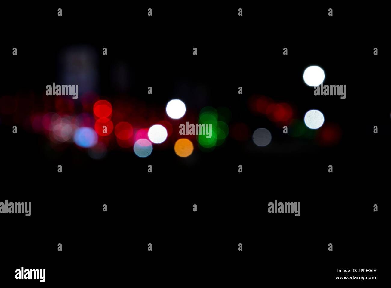 Abstract colorful bokeh light effects on the night black background ...