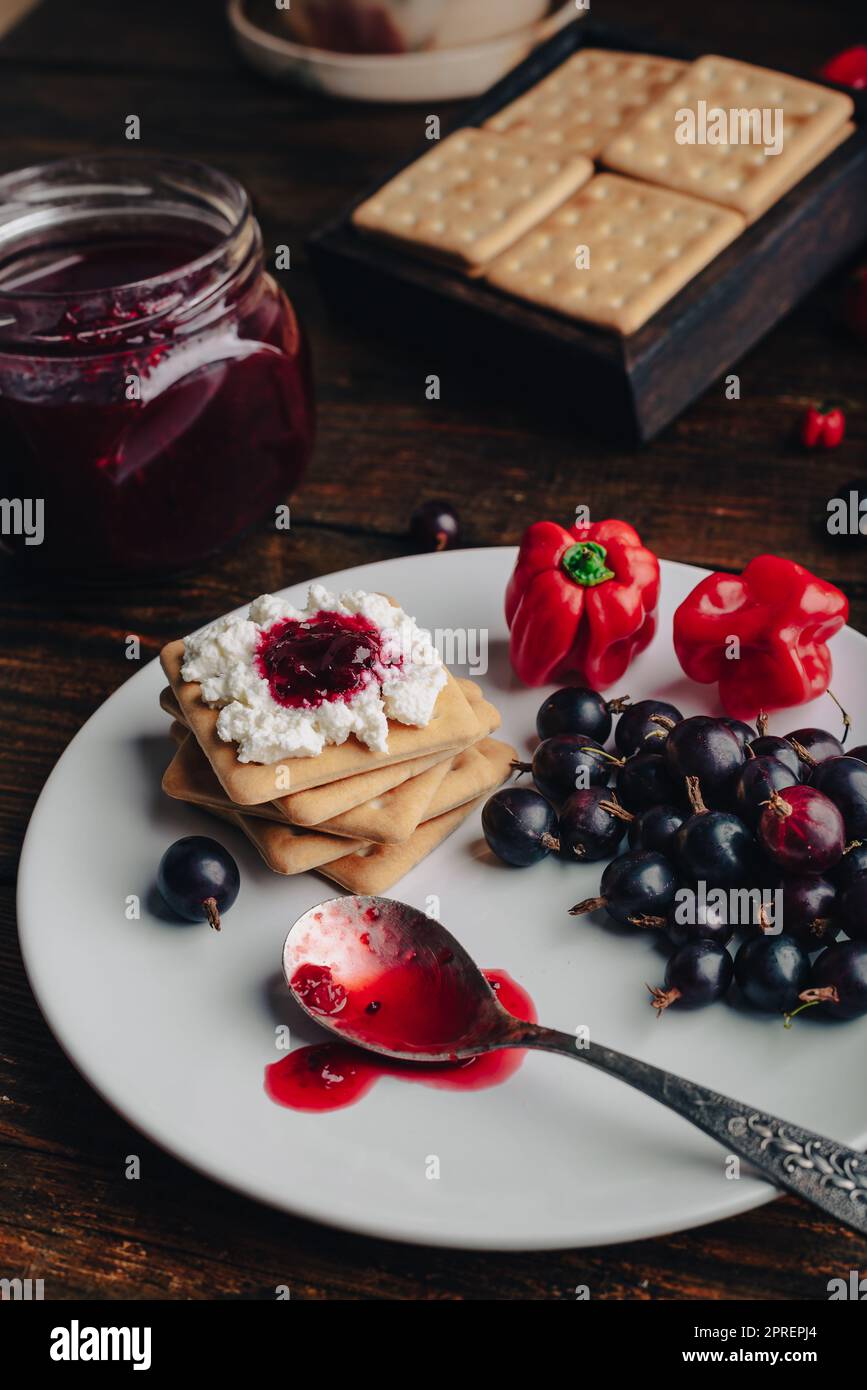 Crackers with Gooseberry and Red Habanero Pepper Jam and Ricotta Cheese