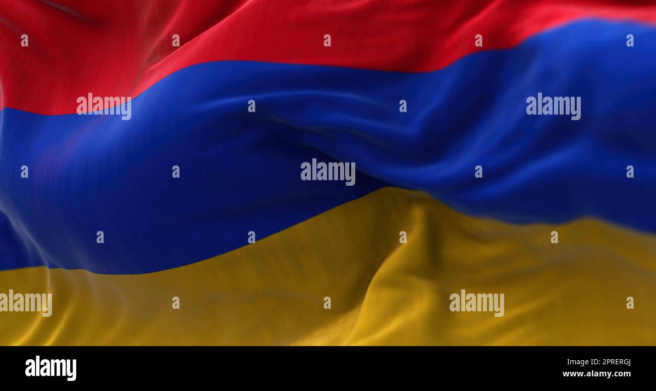 Closeup view of the armenian national flag waving in the wind. Armenia