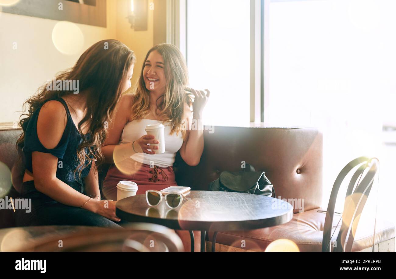 Hanging with her best friend. two attractive young women chilling in their local cafe. Stock Photo