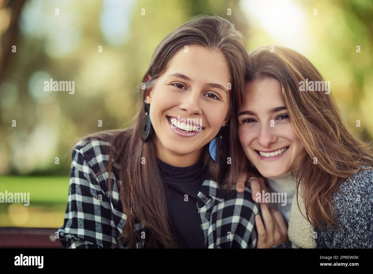 Shes my best friend. Cropped portrait of two attractive young women spending the day outdoors. Stock Photo