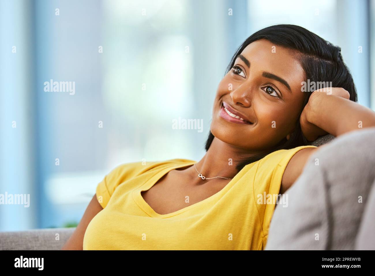 Its great to have time at home just to think. a teenage girl spending the day at home. Stock Photo