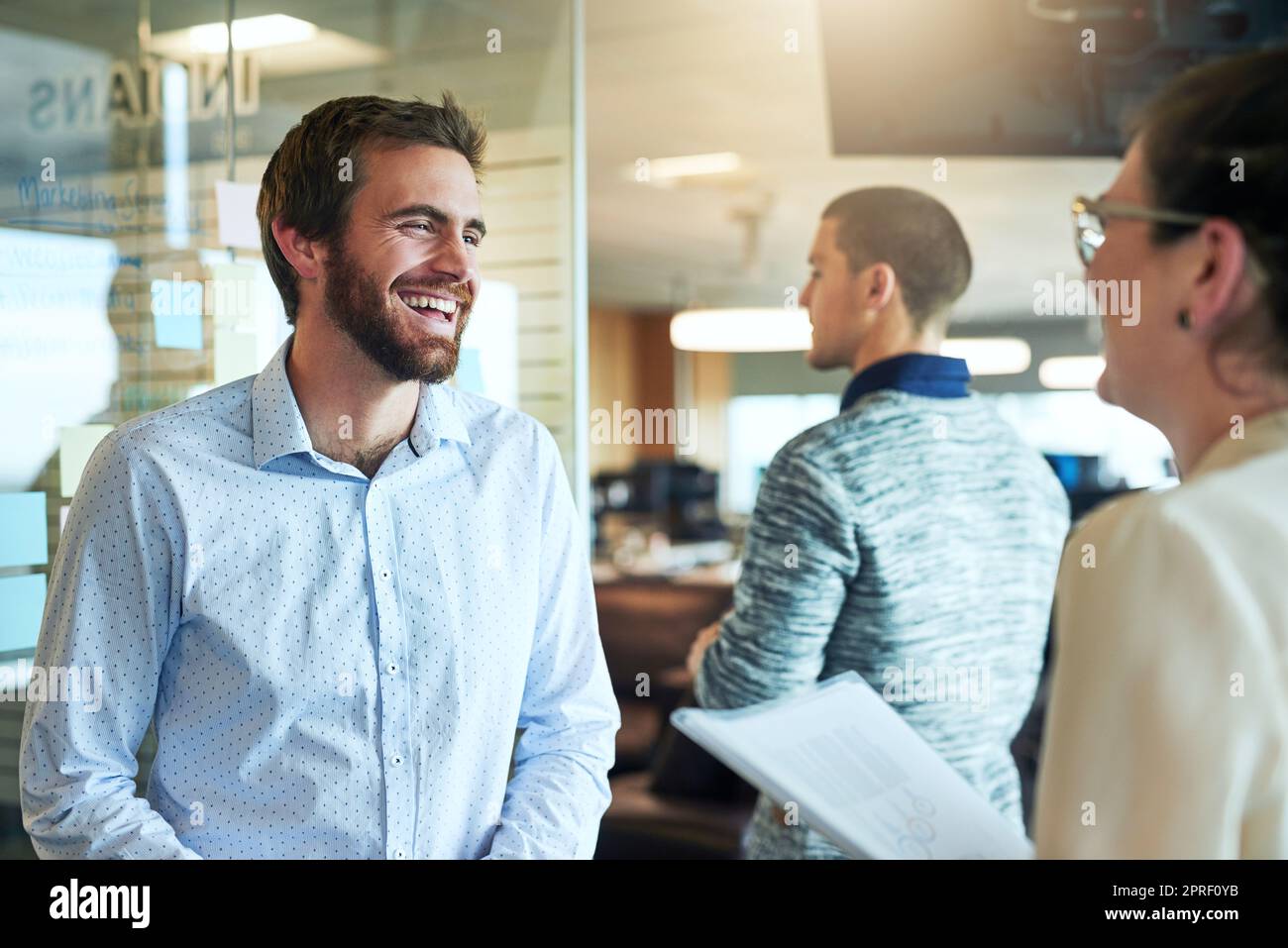 Upholding a positive work ethic makes a difference to business. businesspeople brainstorming in an office. Stock Photo