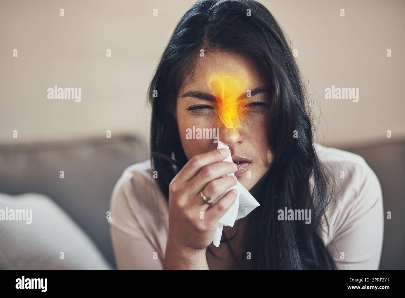 Seasonal allergies can cause nose burning and congestion. a young woman