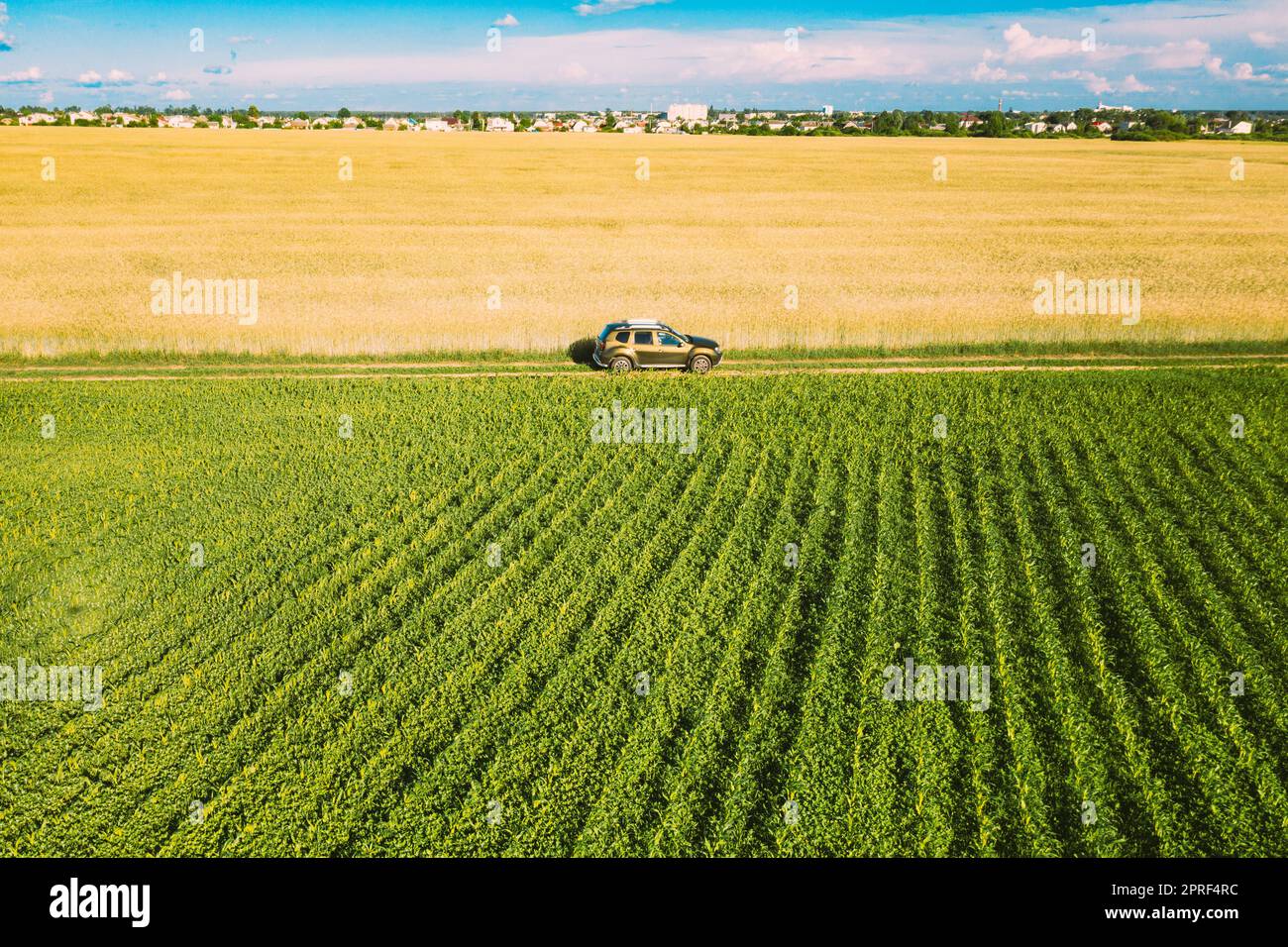 Aerial View Of Car SUV Parked Near Countryside Road In Spring Field ...