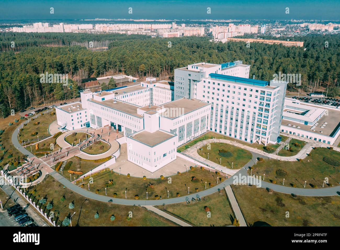 Aerial View OF Building Of Scientific Center For Radiation Medicine And Human Ecology In Spring Sunny Day. Top View. Drone View. Bird's Eye View. Stock Photo