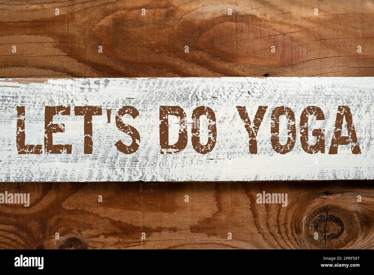 Conceptual display Let S Is Do Yoga. Business approach Right moment for working out by meditation and training Important Informations Written On Piece Of Wood On Floor. Stock Photo