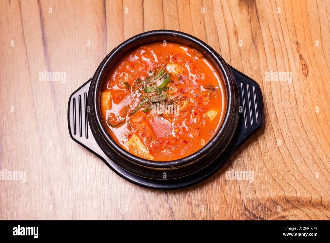 Korean traditional Kimchi Jjigae soup in bowl in the restaurant Stock Photo Alamy