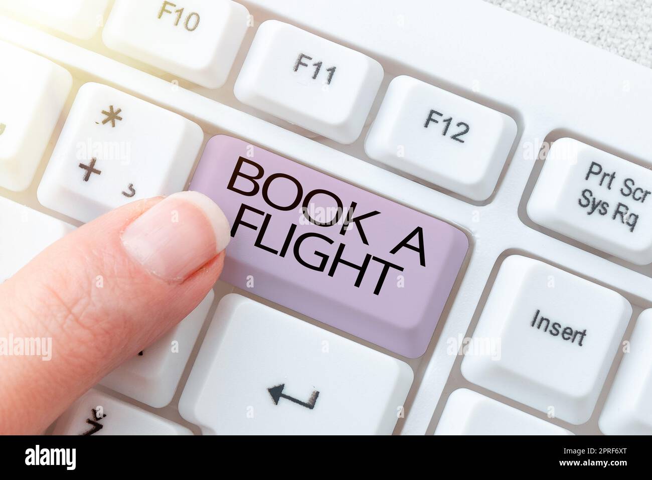 Text sign showing Book A Flight. Internet Concept Purchase tickets to make a trip by plane Planning vacations Businesswoman Holding Speech Bubble With Important Messages. Stock Photo