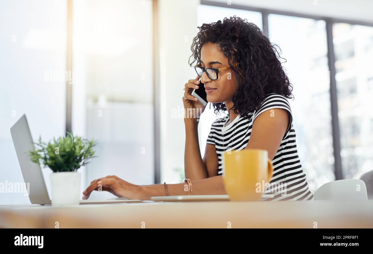 Shes not done until the job is done. a young woman working from home. Stock Photo