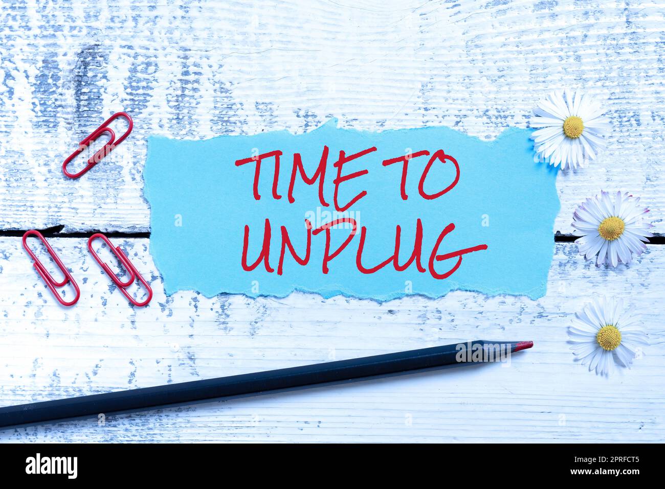 Conceptual caption Time To Unplug. Internet Concept Relaxing giving up work disconnecting from everything Piece Of Carboard With Important Message Surrounded By Paper Wraps. Stock Photo