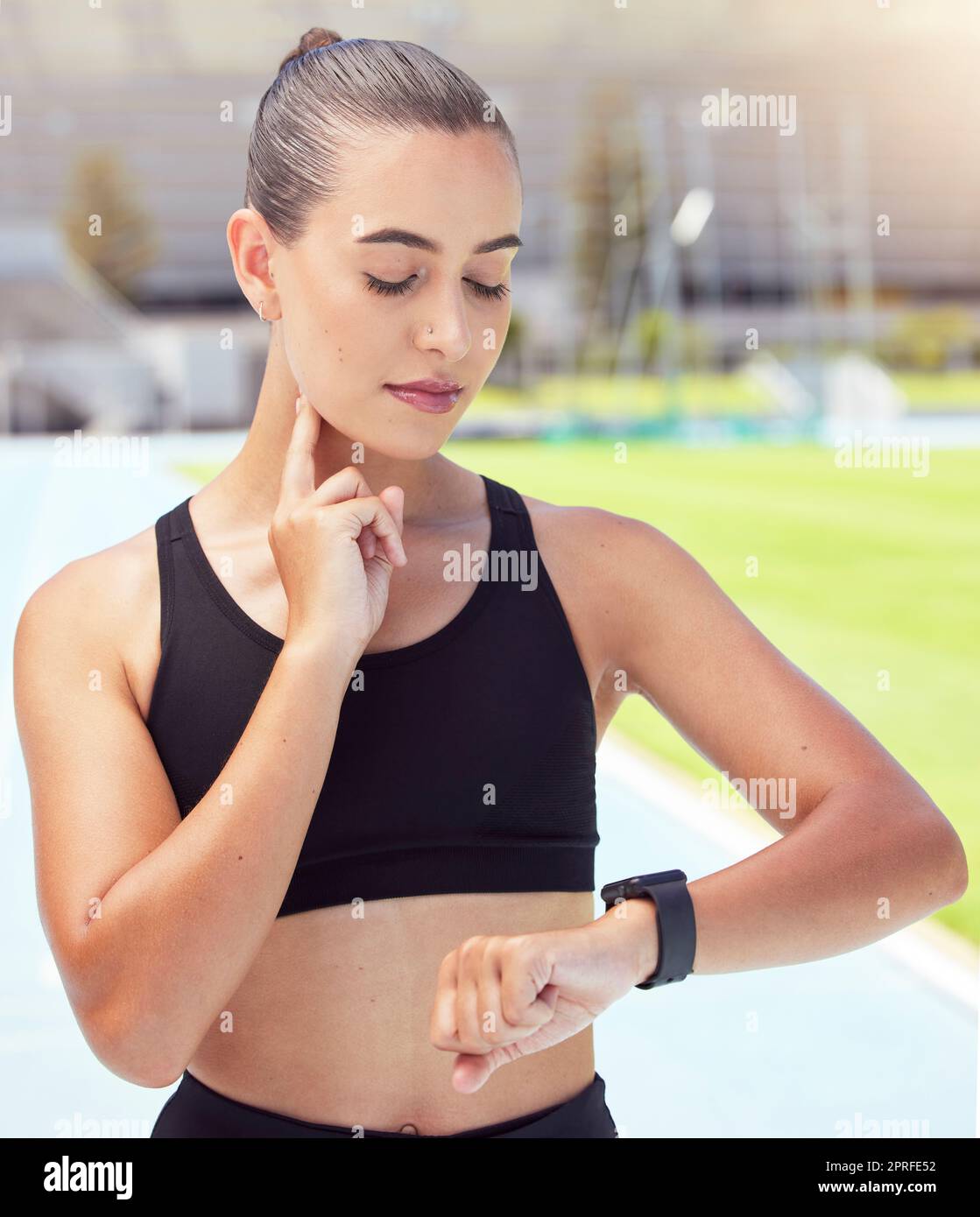 Fitness woman, smartwatch and checking pulse after exercise, workout or