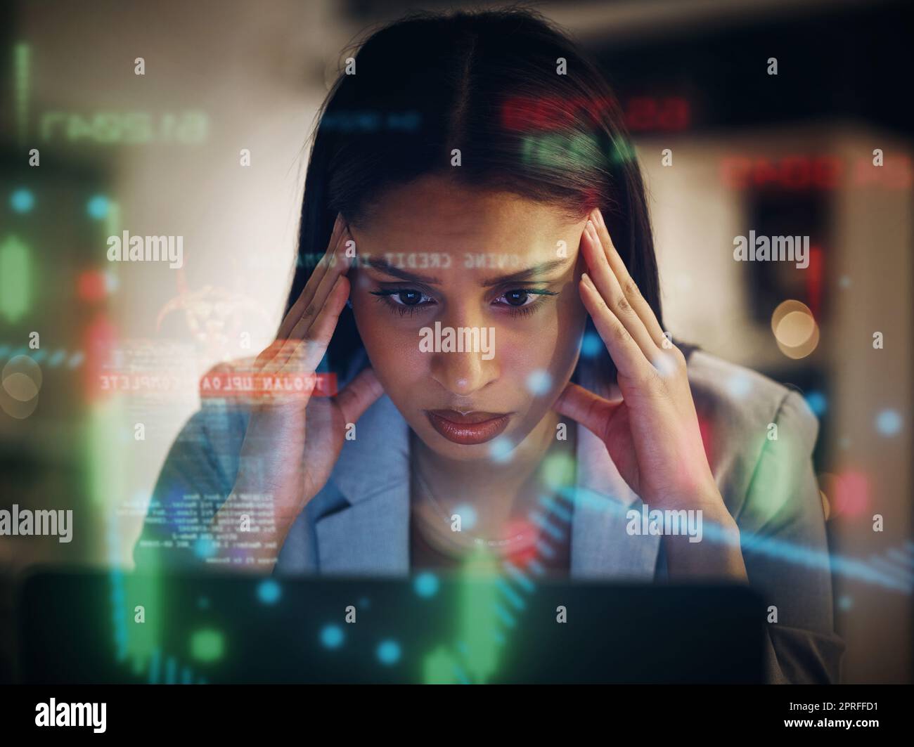 Headache, stressed and serious frustrated finance trader feeling bad, tired and unhappy with her financial stock investments. Upset, worried and worried female thinking while working on her computer Stock Photo