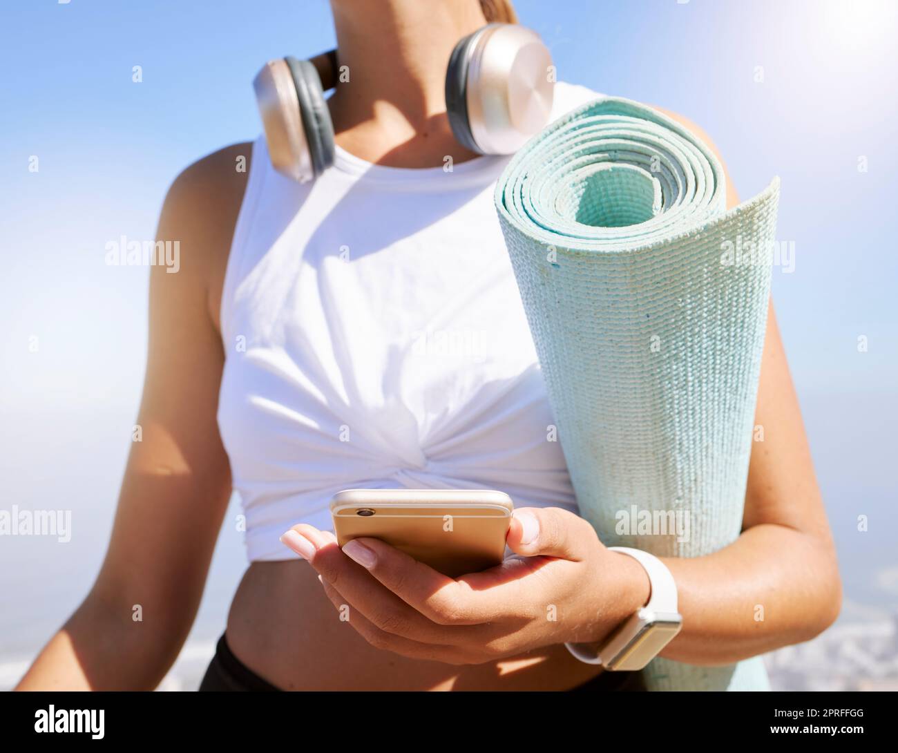 Fitness, yoga and woman on a phone in nature, texting and listening to  music before summer outdoor workout. Radio, podcast and wellness exercise  with Stock Photo - Alamy