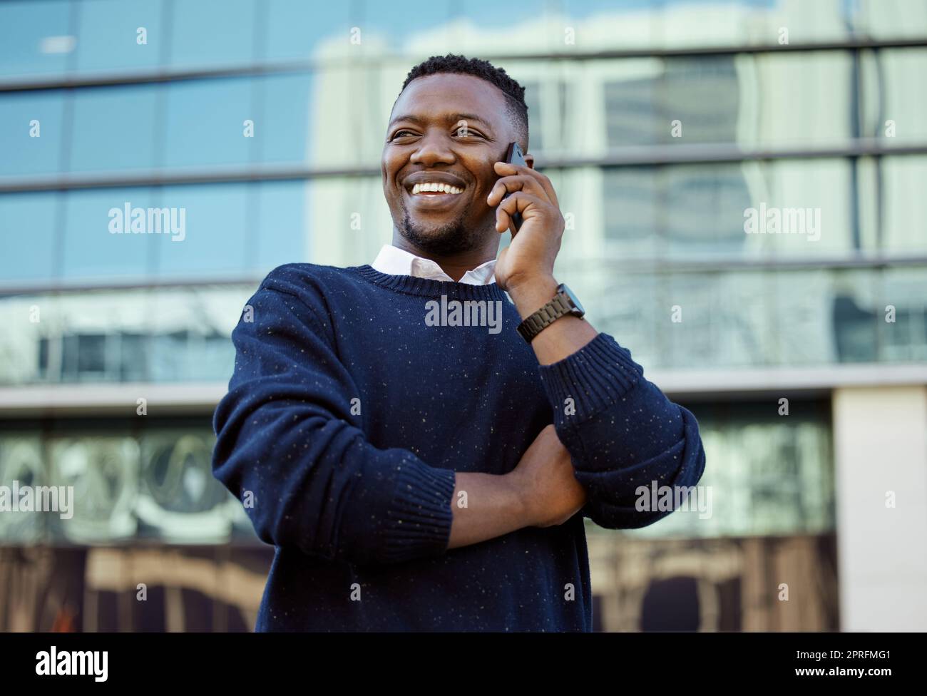 Phone, communication and networking with a business man talking on a call outside in the city in the day. Vision, motivation and conversation for growth, development and the future of his company Stock Photo