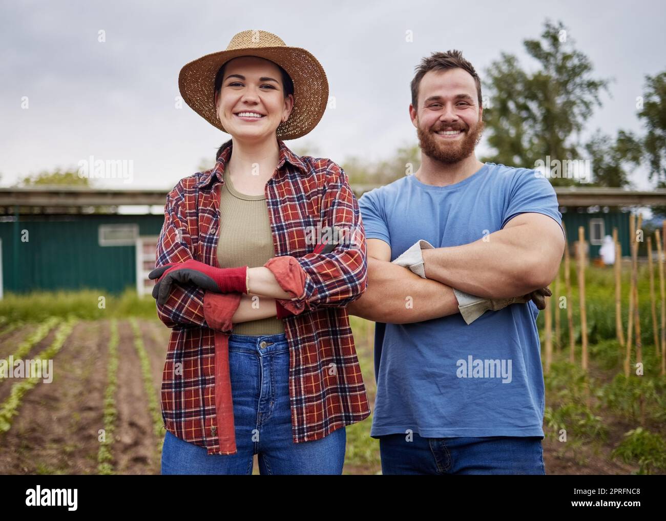 Couple working on garden, field and nature environment for plant growth