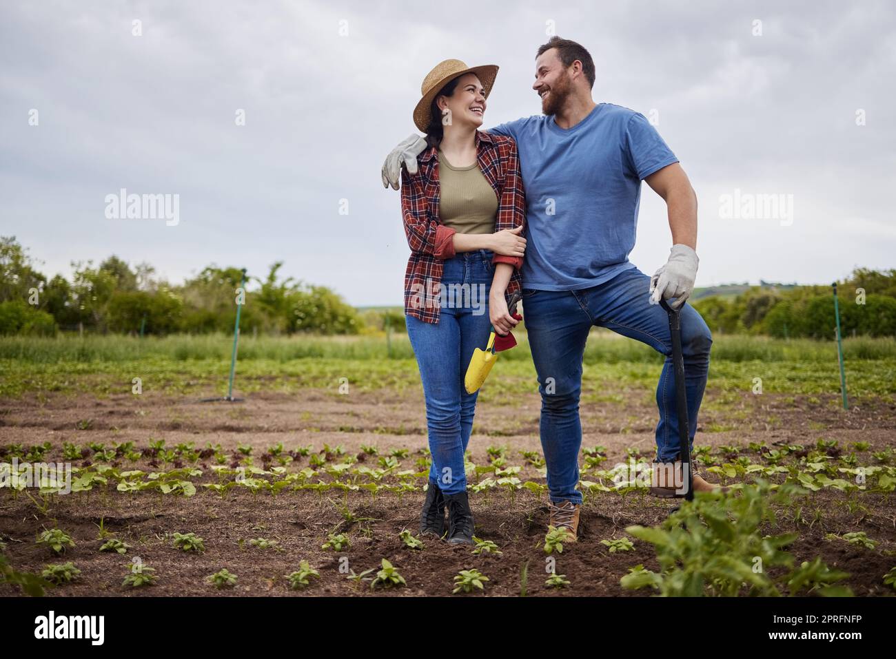 Startup, success and agriculture, couple work farm together. Sustainability, teamwork and small business of sustainable food production. Happy farmer, man and woman work in growth, love and farming. Stock Photo