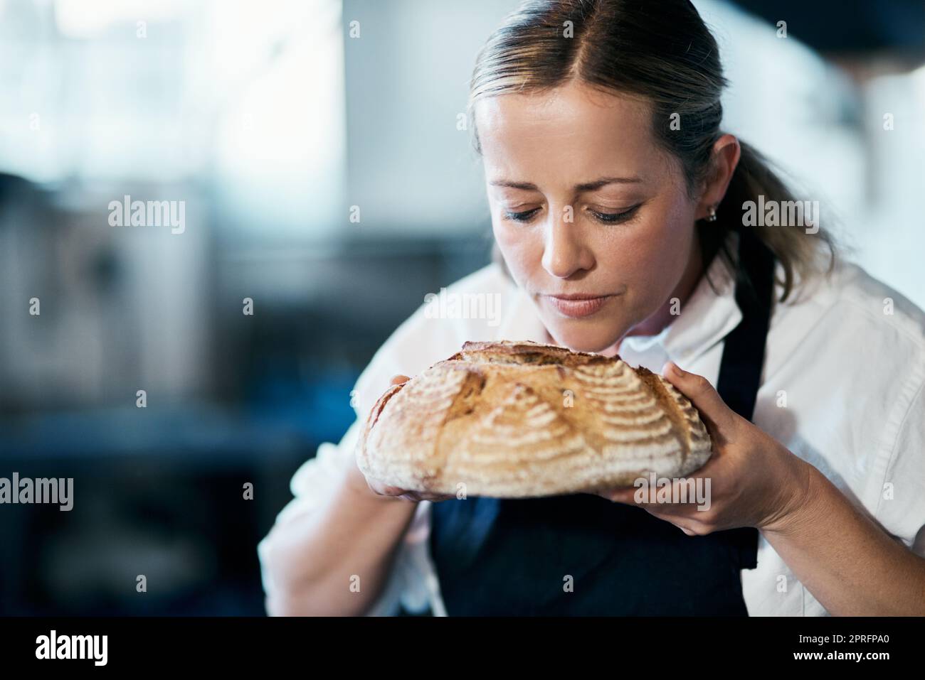 Mature female woman fresh made bread hires stock photography and