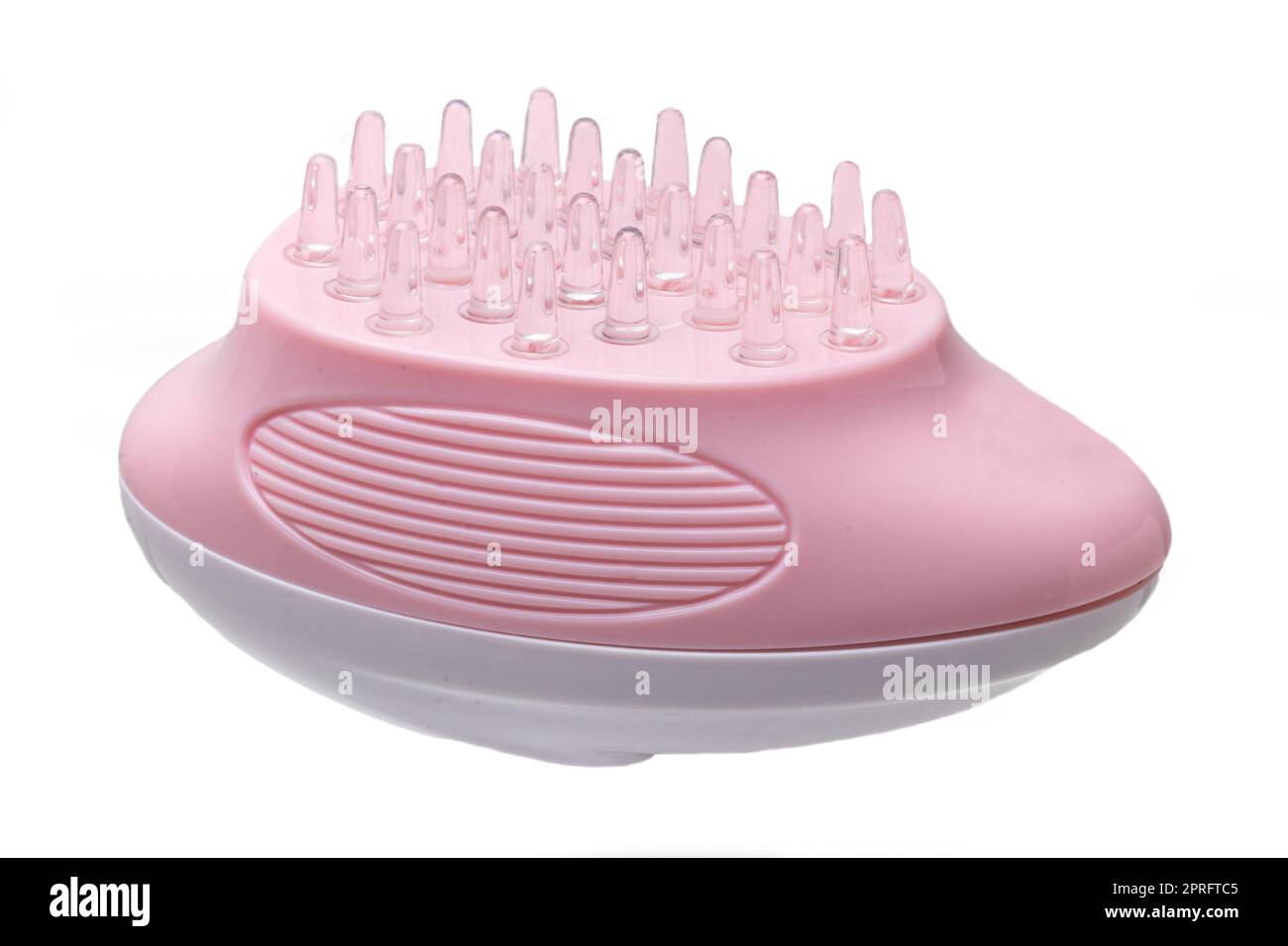 Close up of a battery operated scalp massage brush, shampoo brush or scalp massager for exfoliating and massaging the scalp.Clipping path. Beauty and health concept. Stock Photo