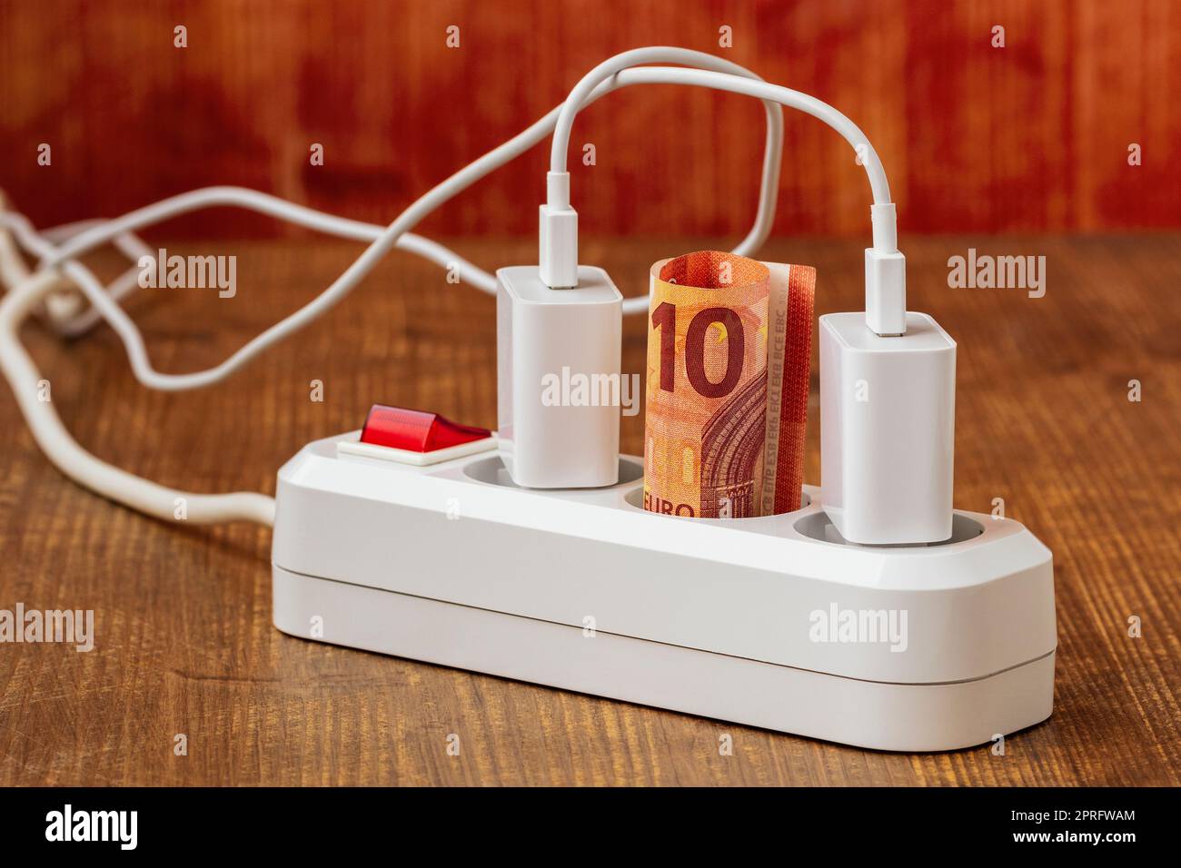 Electric extension cord and 10 Euro banknote Stock Photo Alamy