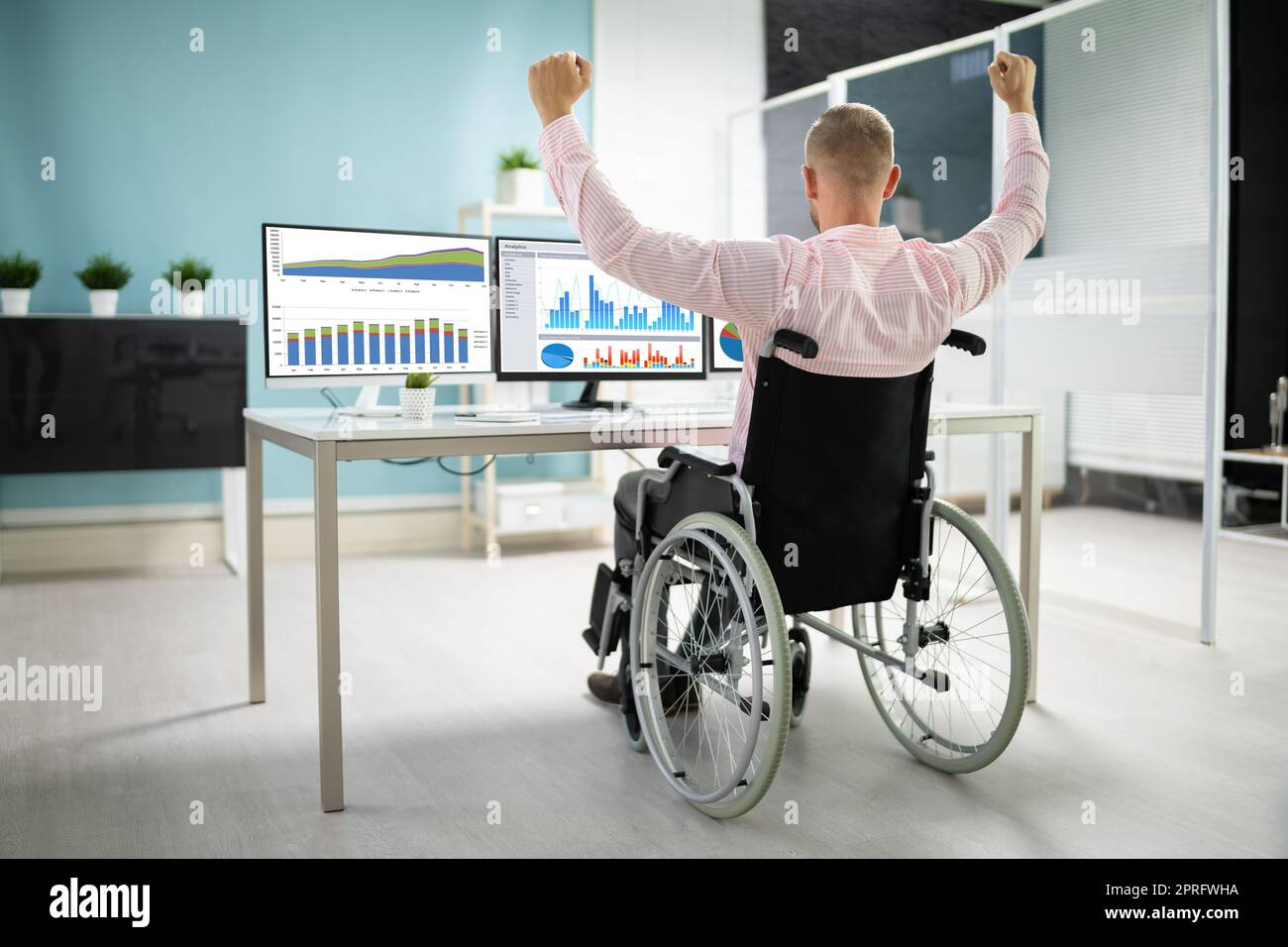 Excited Business Data Analyst Man Celebrating Stock Photo
