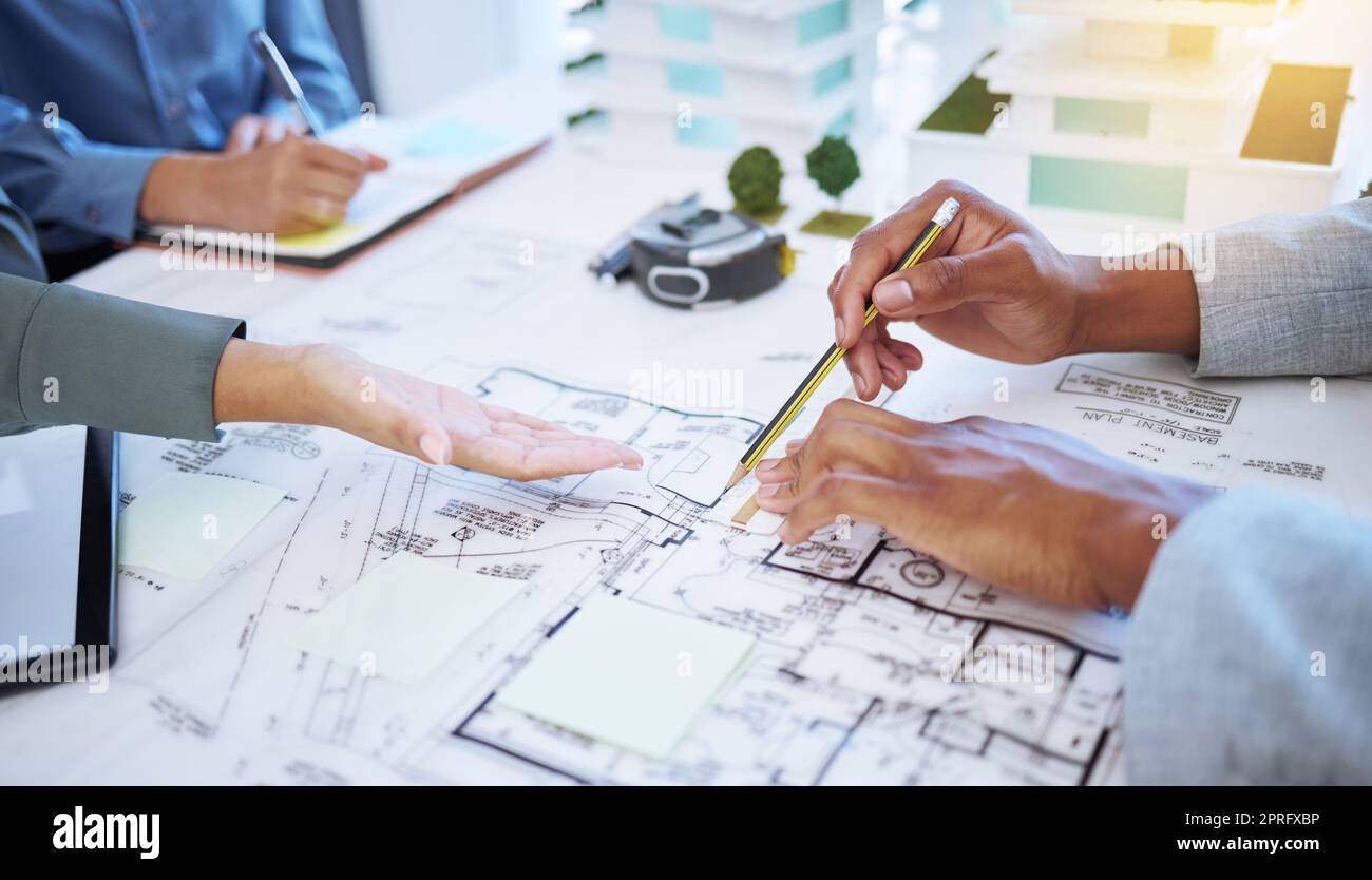 Hands of architecture blueprint design, 3d property construction building and engineering model planning. Creative team collaboration on floor plan sketch, drawing development and industrial project Stock Photo