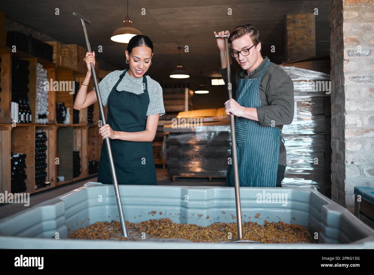 Production, manufacturing worker and teamwork in wine industry and