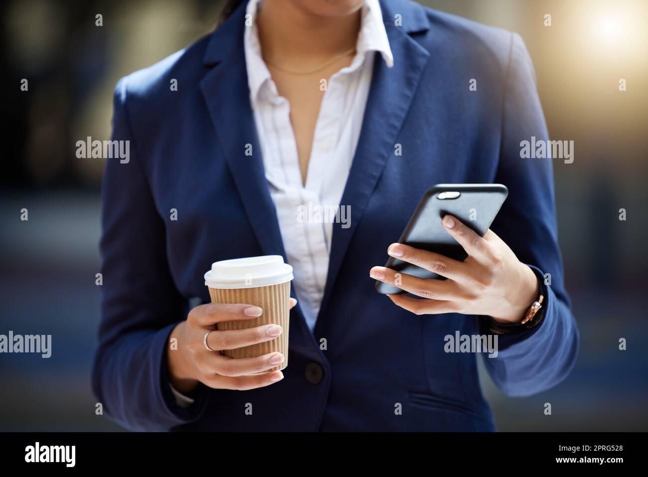 Coffee break and phone in hands of a business woman reading email, online internet notification or communication for contact us background. Corporate marketing professional worker with a cellphone Stock Photo