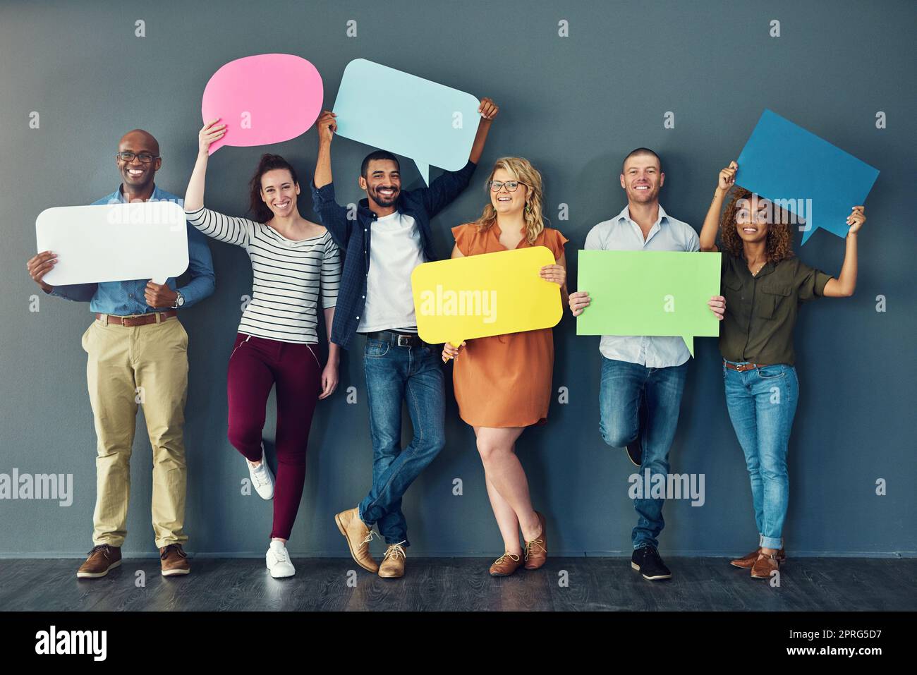 Speech bubbles, blank boards and signs held by voters with freedom of democracy and opinion. The review, say and voice of people in public news adds good comments to a diverse group Stock Photo