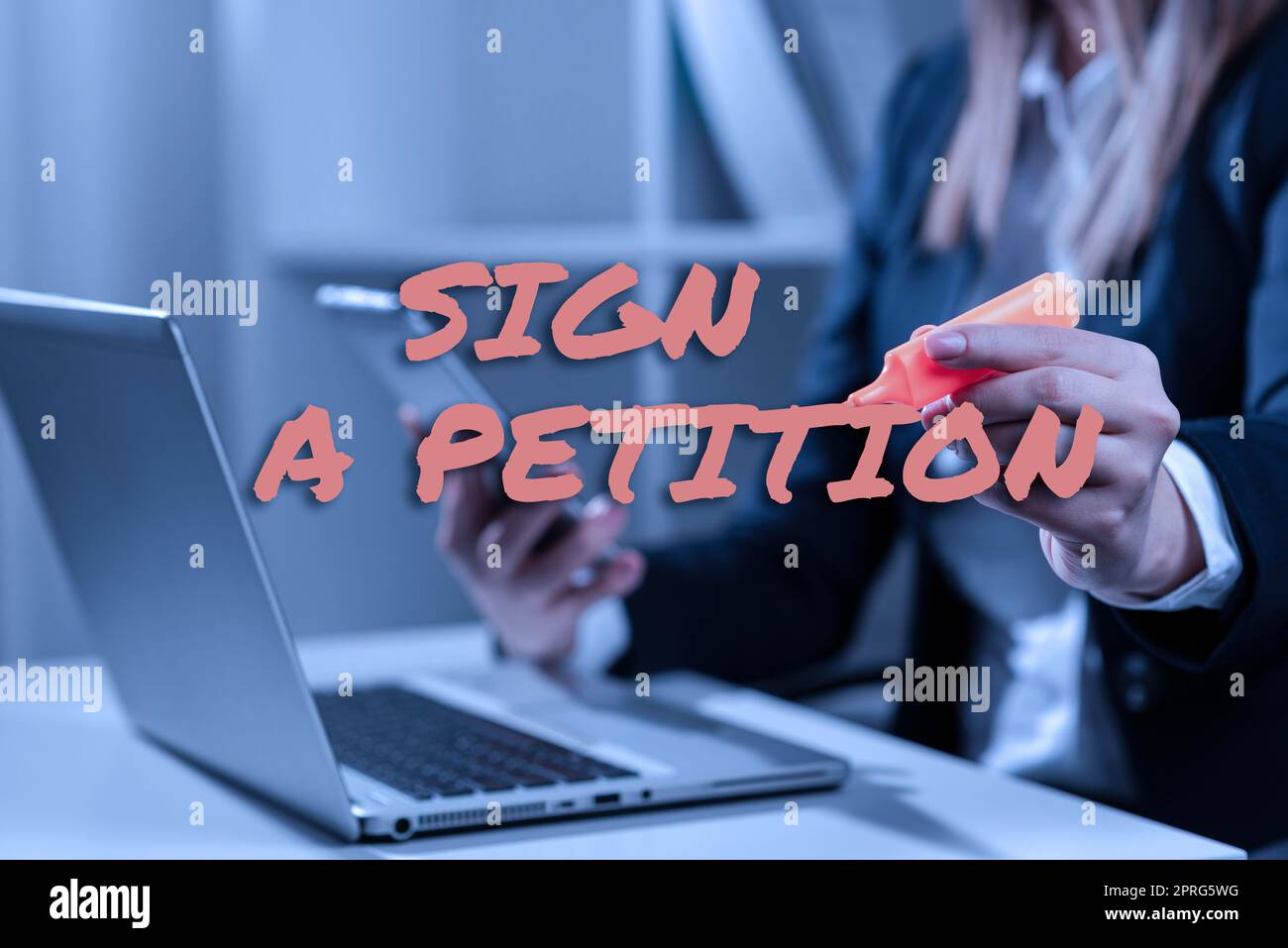 Sign displaying Sign A Petition. Word Written on Support a cause by signing paper with an agreement Piece Of Paper On Floor With Important Information Written In. Stock Photo
