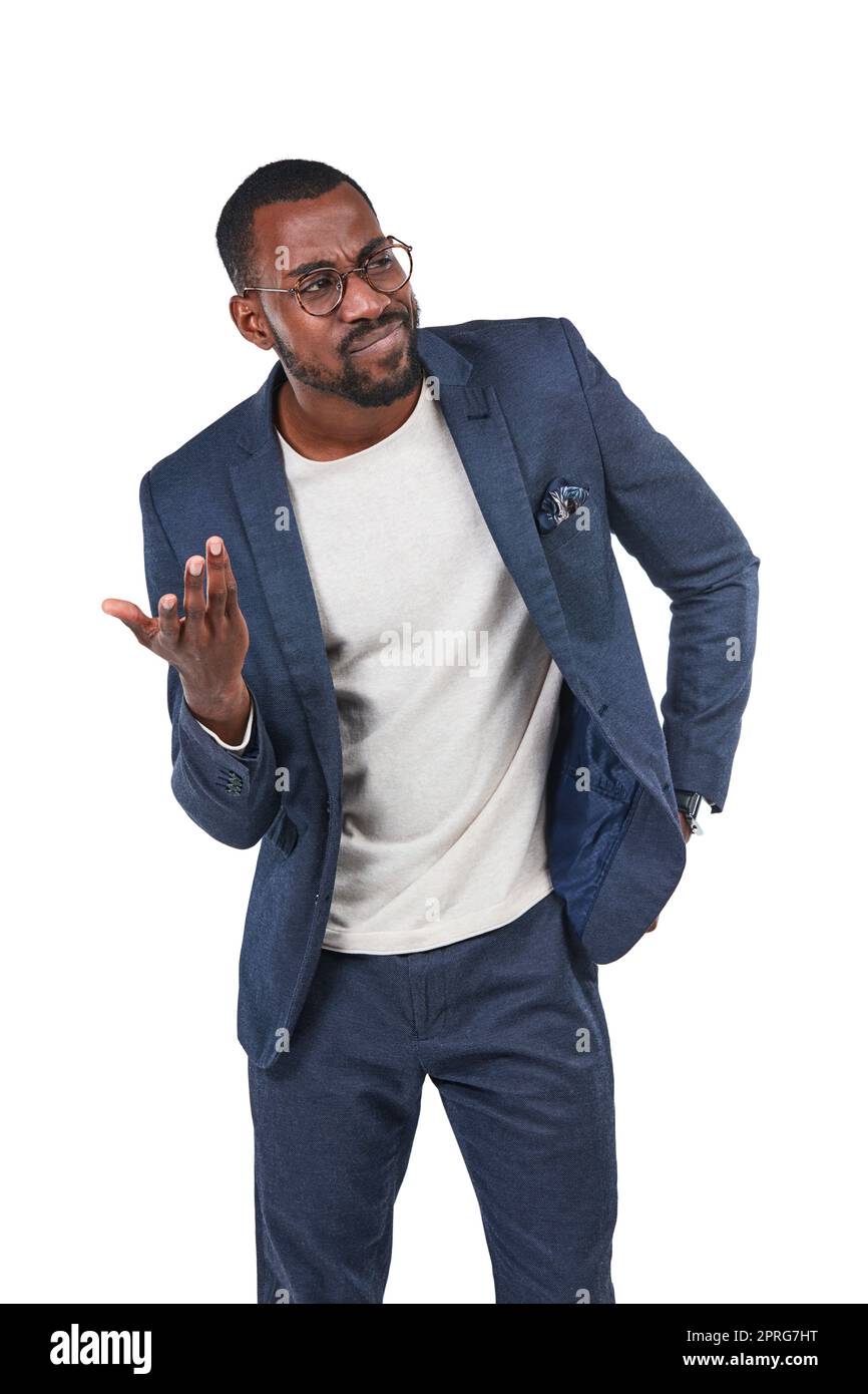 Im not buying that. Studio shot of a young businessman looking skeptical against a white background. Stock Photo