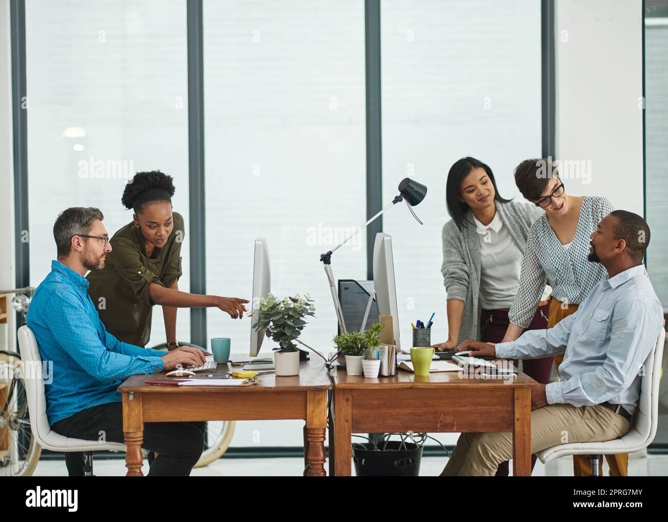 Another day in the office. a group of colleagues working in their office. Stock Photo