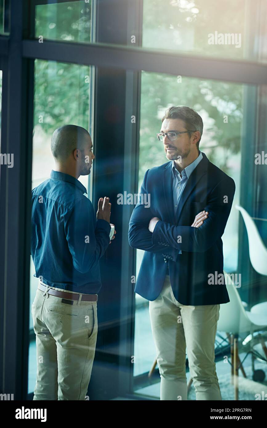 See, what happened is...an unimpressed employer listening to an employees excuses. Stock Photo