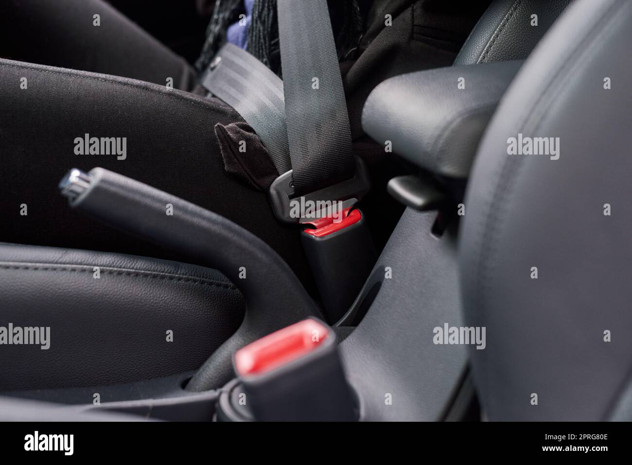 Safety first. Closeup shot of a seatbelt inside a motor vehicle. Stock Photo