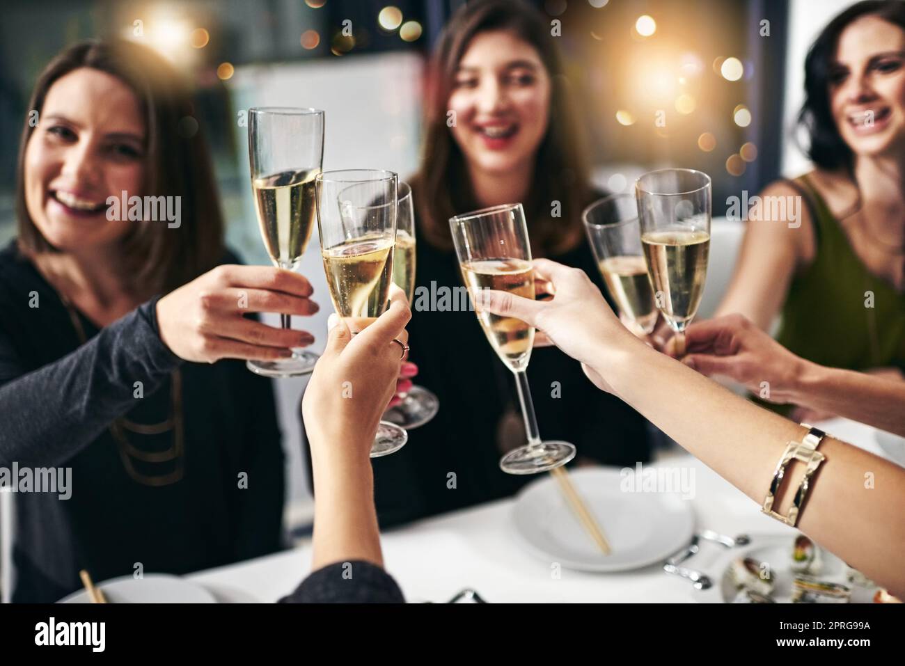 Toasting woman champagne restaurant hi-res stock photography and images ...